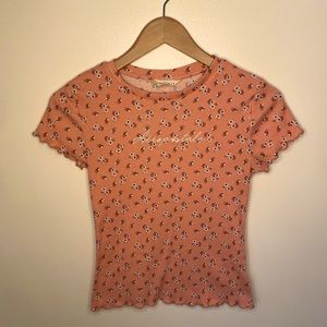 Girls youth Aeropostale short sleeve tee with floral pattern.